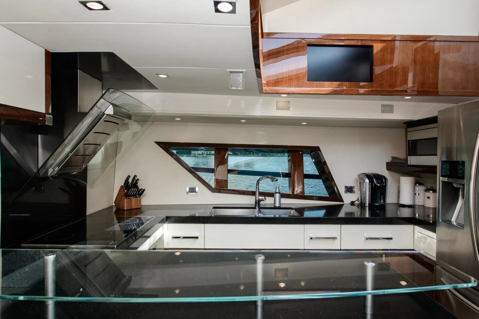 a kitchen with a large island aboard CHAPTER II Yacht for Sale