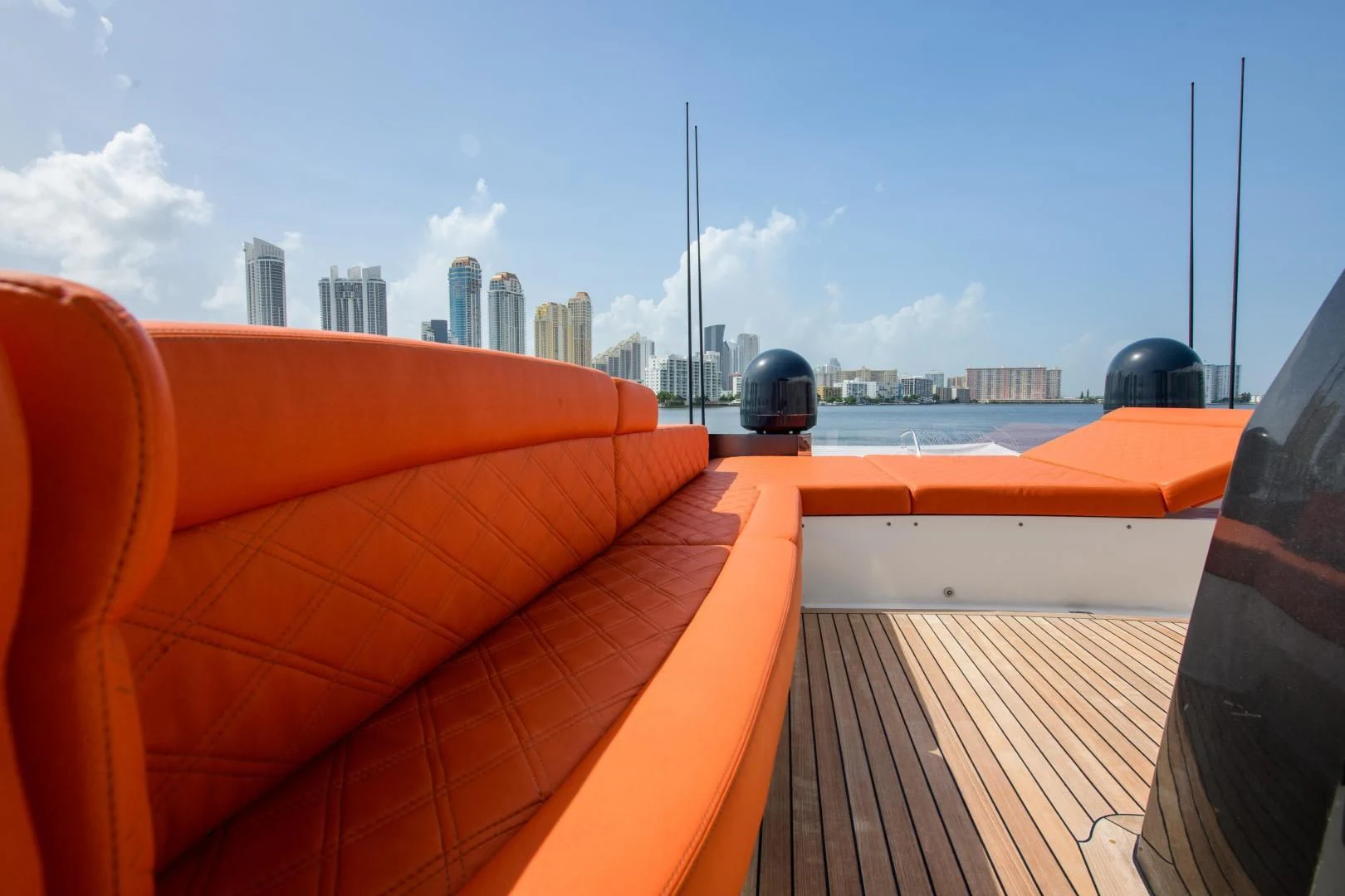 a rooftop with a view of a city and a body of water aboard CHAPTER II Yacht for Sale