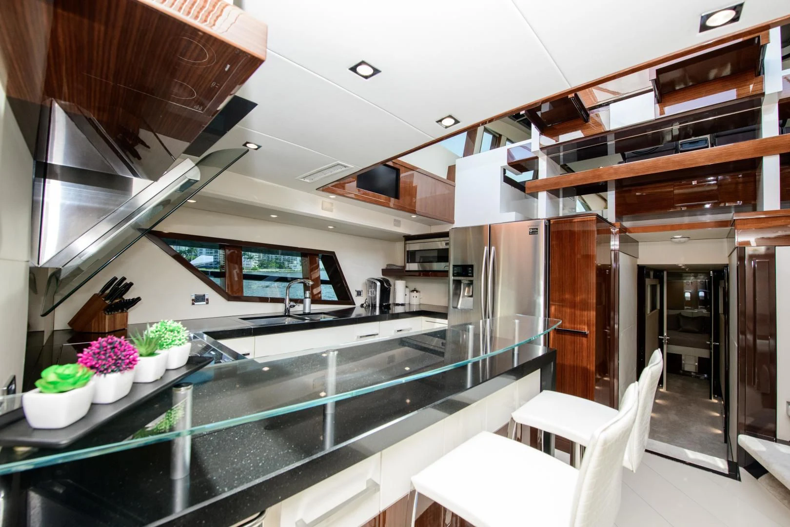 a kitchen with a glass counter aboard CHAPTER II Yacht for Sale