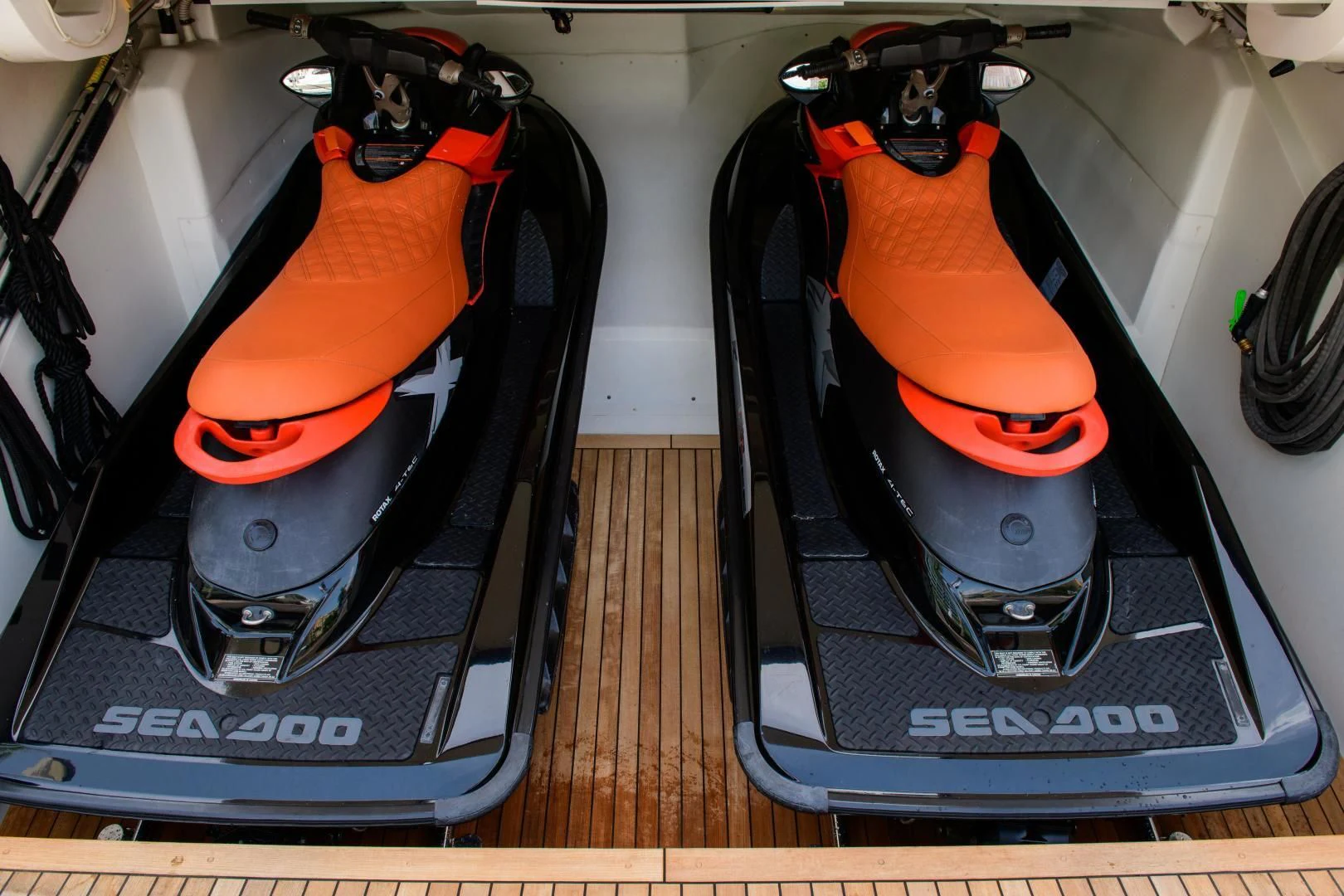 a pair of orange and black goggles on a table aboard CHAPTER II Yacht for Sale