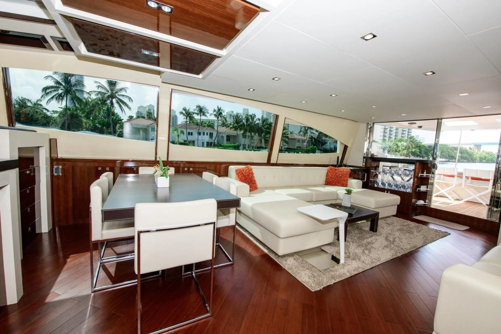 a living room with a large window aboard CHAPTER II Yacht for Sale