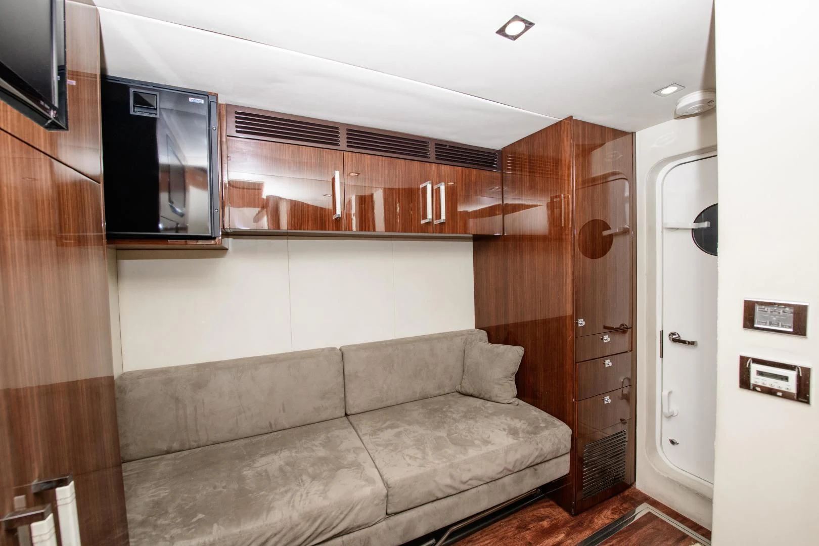 a living room with a couch aboard CHAPTER II Yacht for Sale