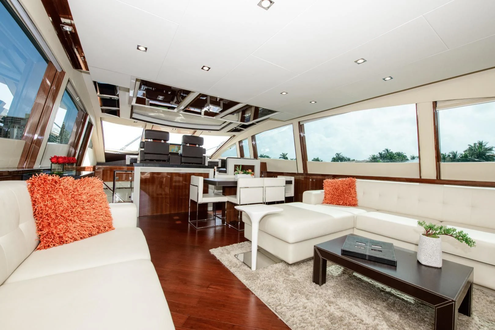 a living room with a couch and a coffee table aboard CHAPTER II Yacht for Sale