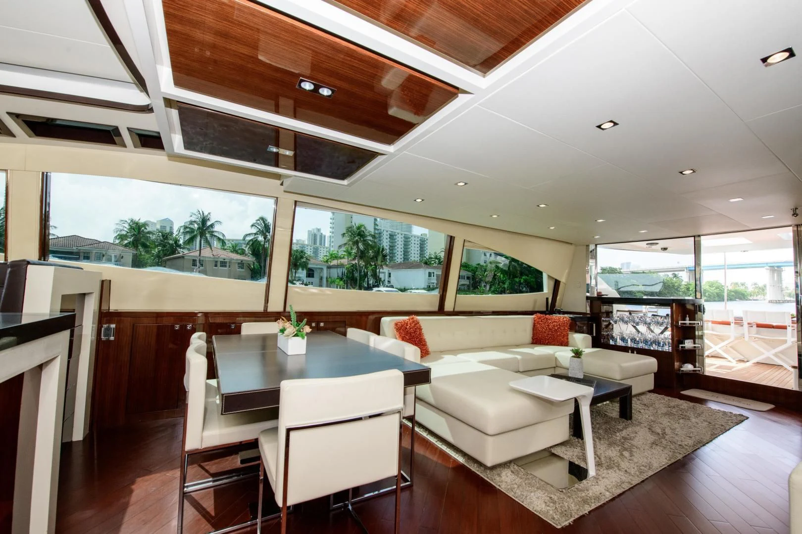 a living room with a large window aboard CHAPTER II Yacht for Sale