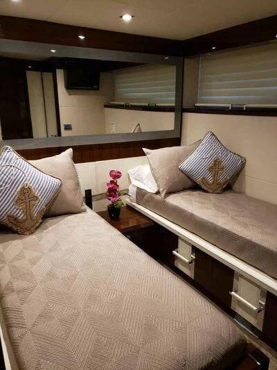 a bed with pillows and pillows aboard CHAPTER II Yacht for Sale