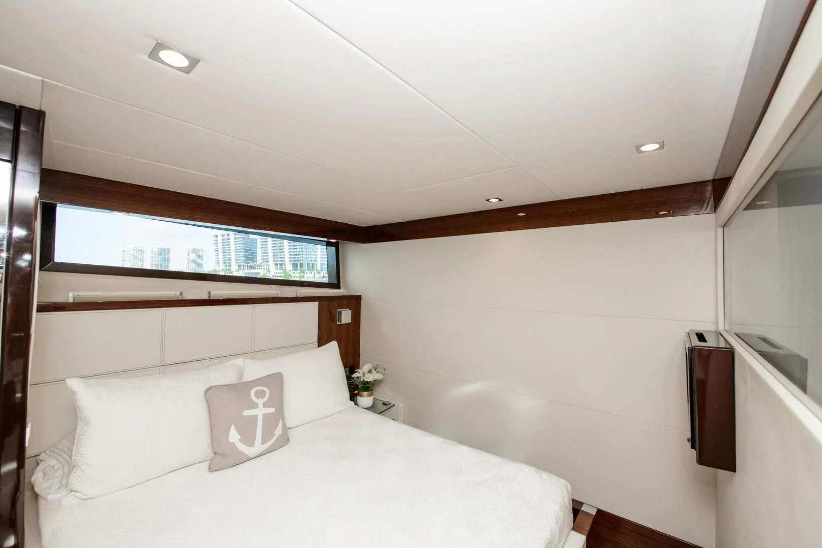 a bedroom with a large bed aboard CHAPTER II Yacht for Sale