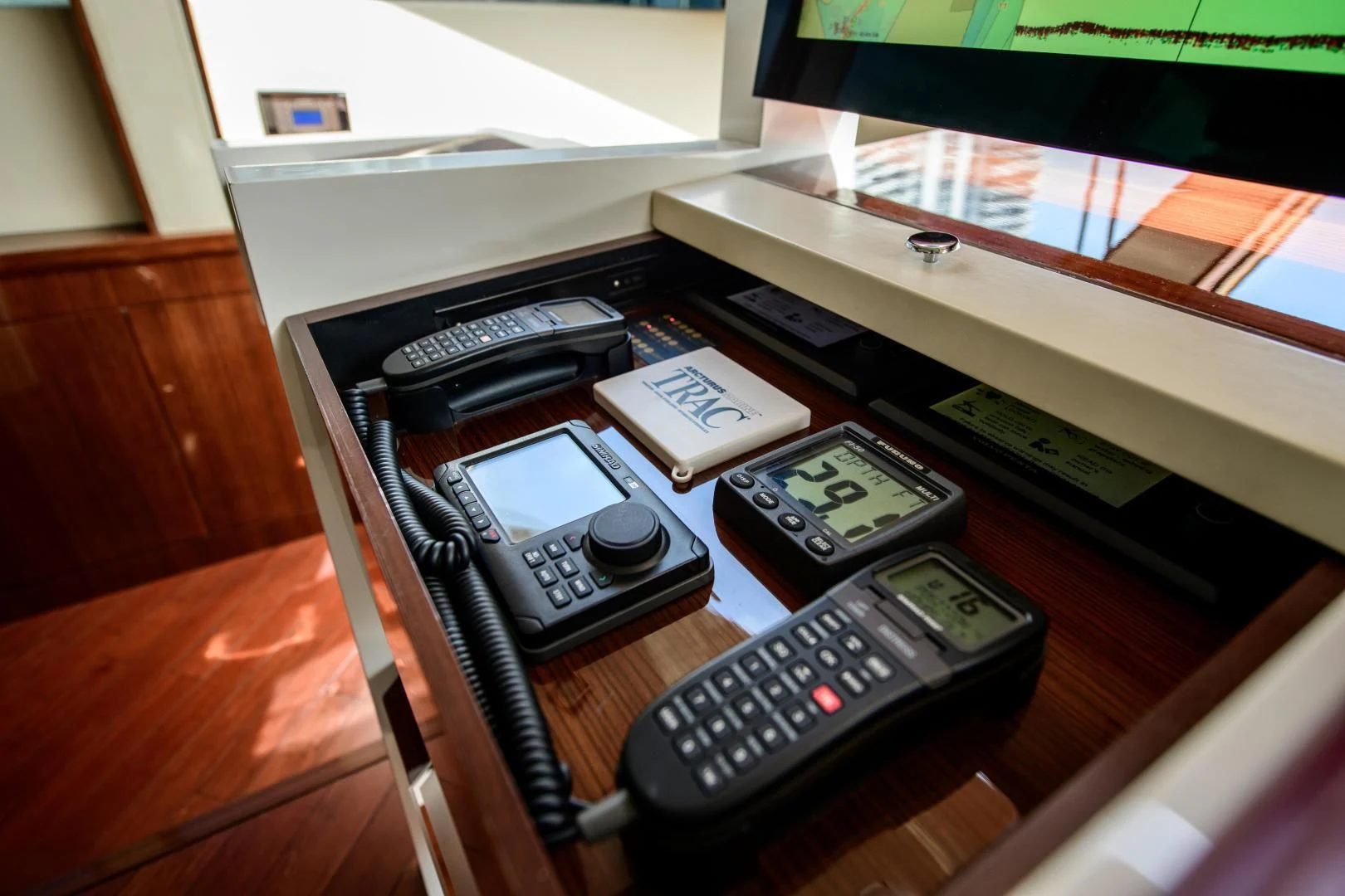 a desk with a telephone and a monitor aboard CHAPTER II Yacht for Sale