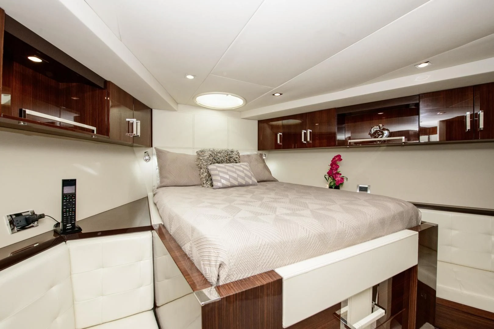 a room with a bed and a desk aboard CHAPTER II Yacht for Sale