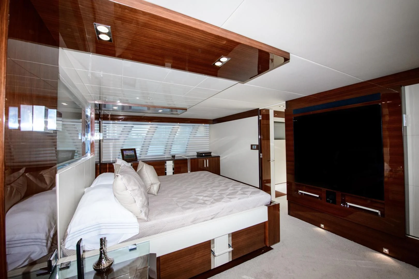 a room with a bed and a television aboard CHAPTER II Yacht for Sale
