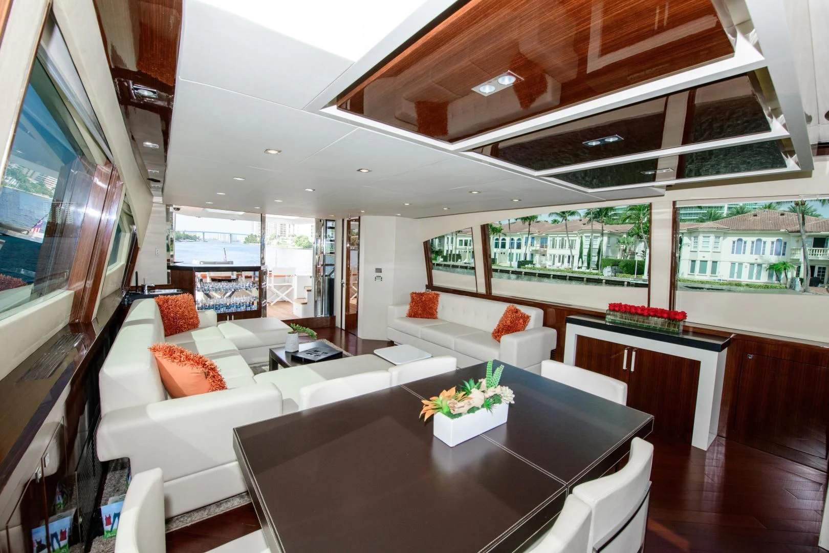 a room with a couch and a table aboard CHAPTER II Yacht for Sale