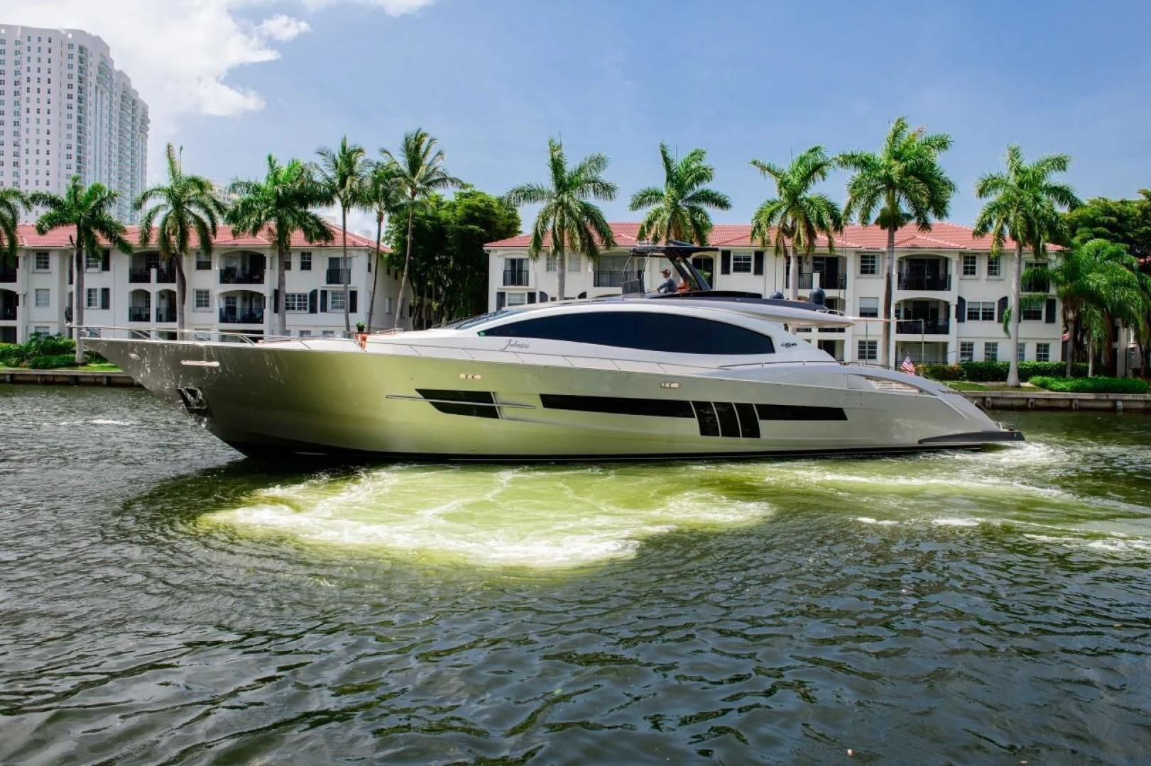 a white boat on water aboard CHAPTER II Yacht for Sale