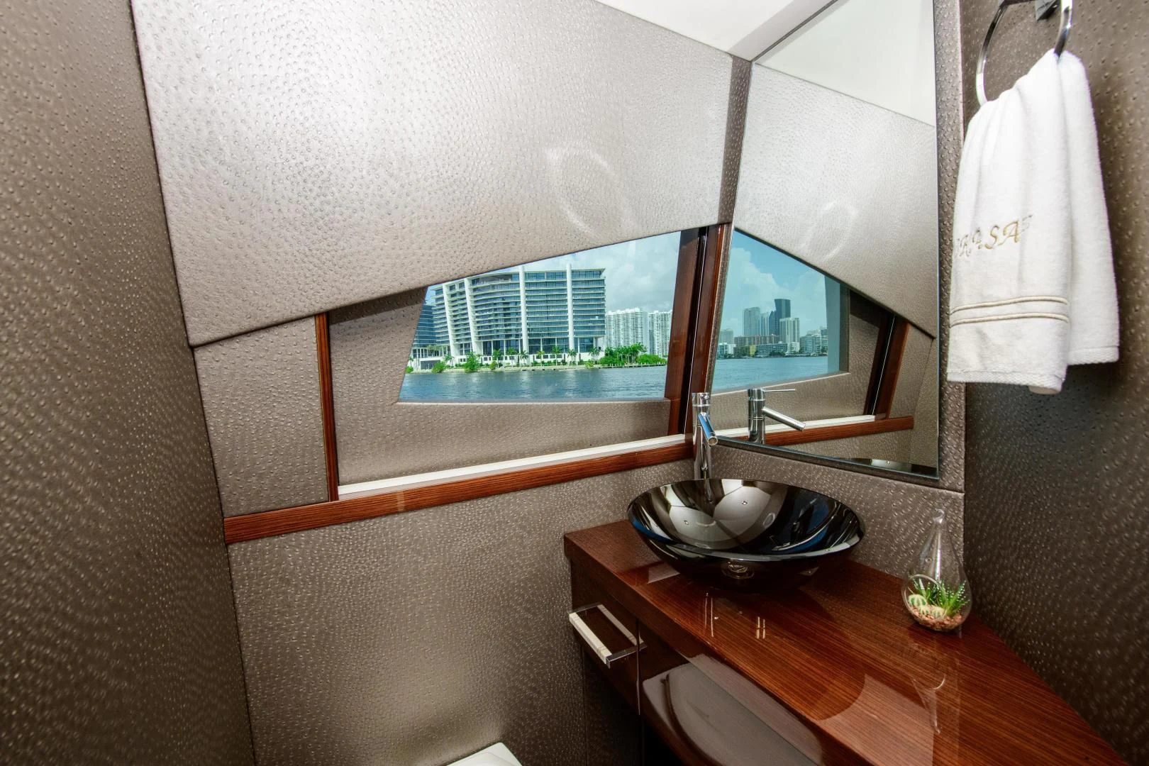 a room with a table and a window aboard CHAPTER II Yacht for Sale