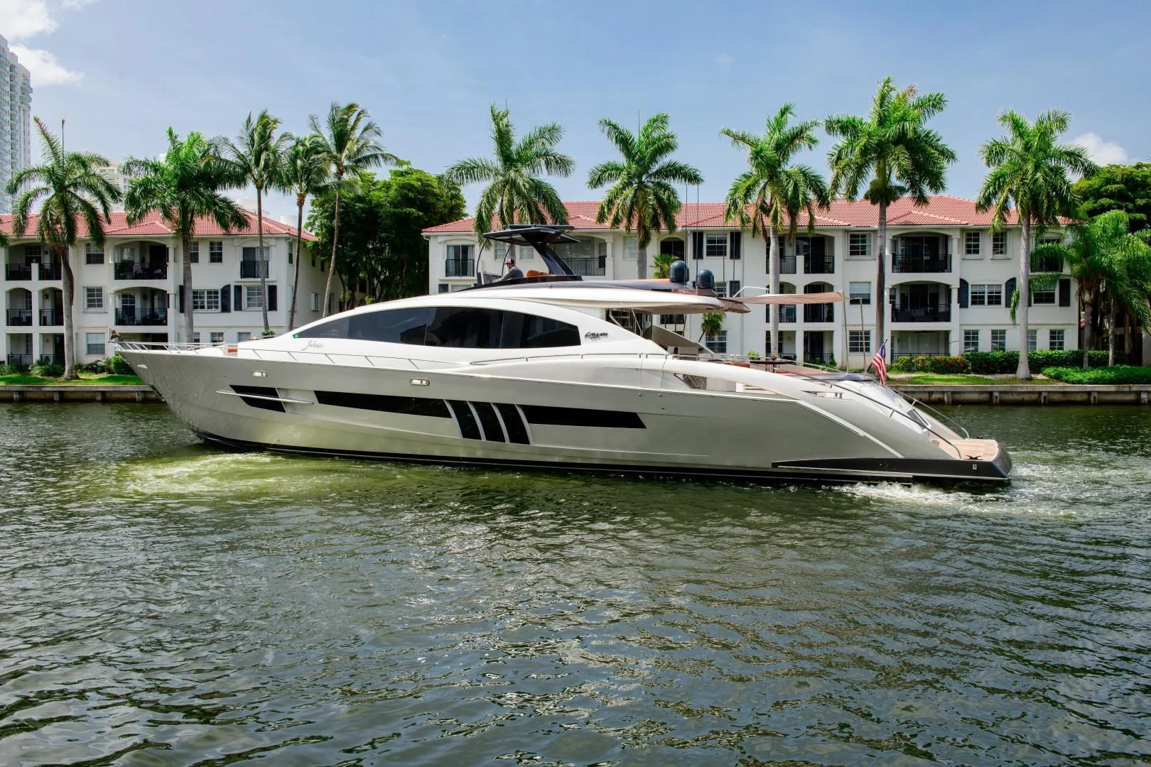 a white boat on the water aboard CHAPTER II Yacht for Sale