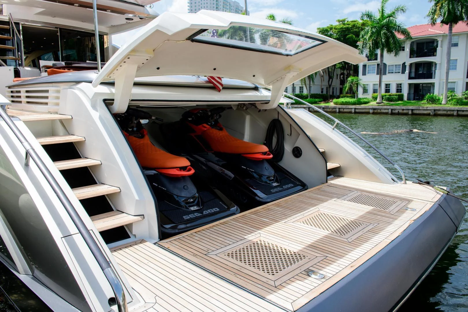 a boat with a motor on the front aboard CHAPTER II Yacht for Sale
