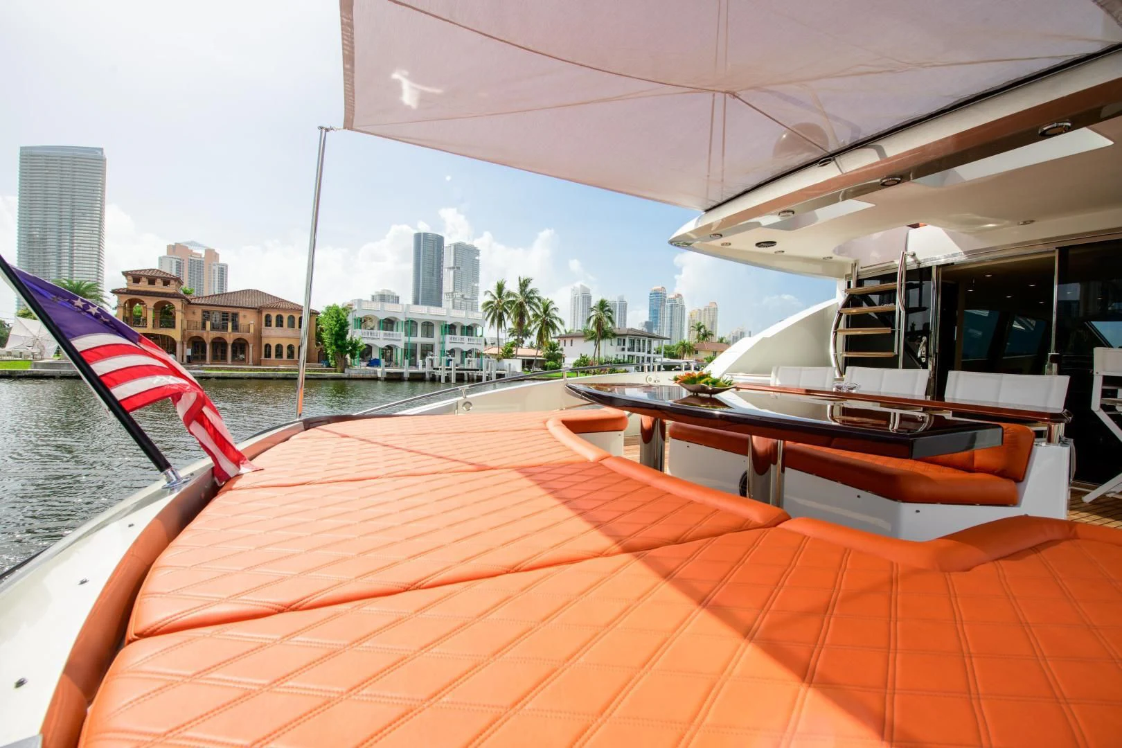 a person holding an umbrella aboard CHAPTER II Yacht for Sale