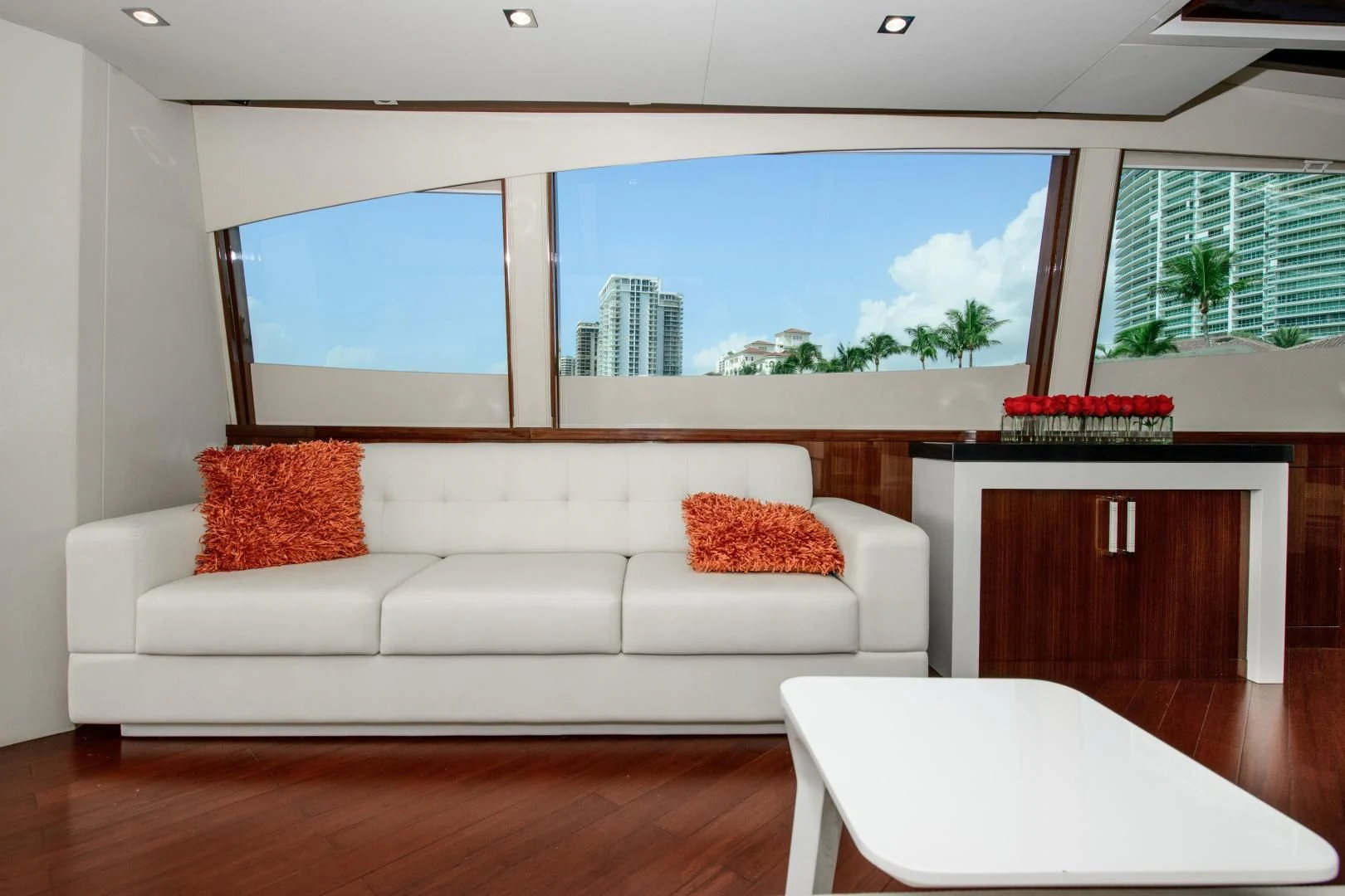 a white couch in a room aboard CHAPTER II Yacht for Sale