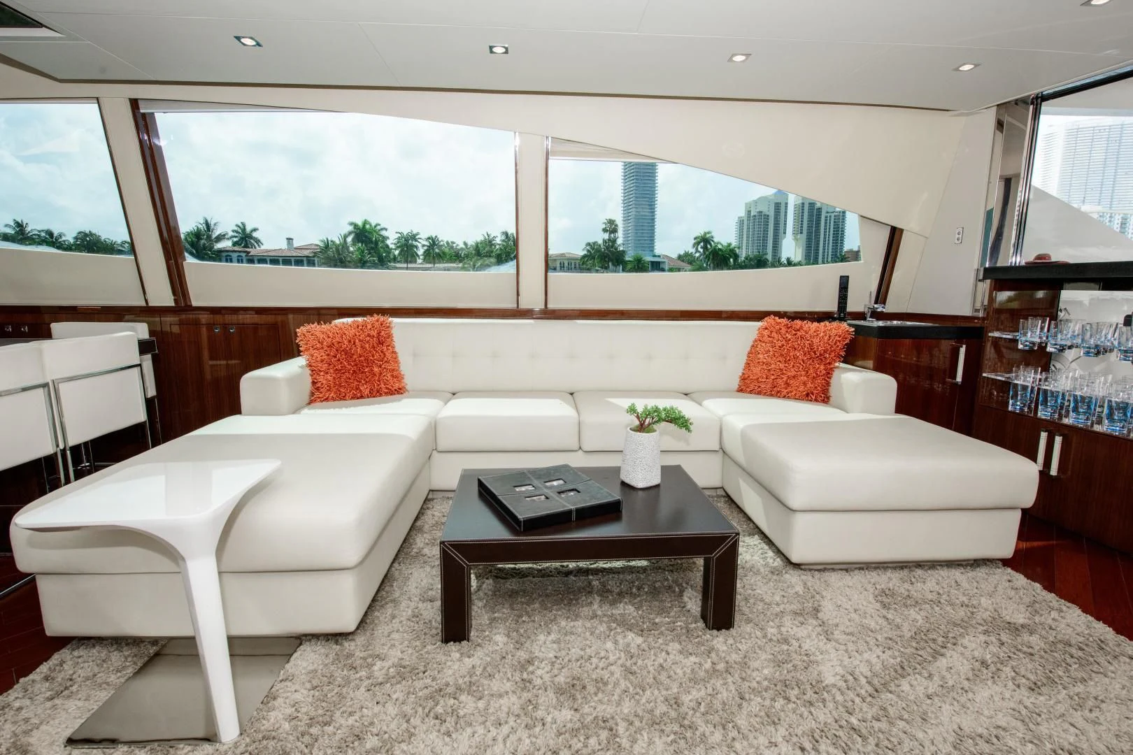 a living room with a couch and a coffee table aboard CHAPTER II Yacht for Sale