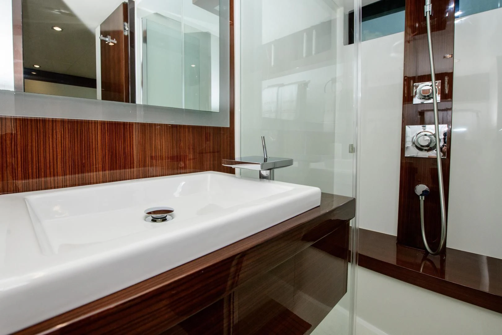a bathroom with a bathtub and sink aboard CHAPTER II Yacht for Sale