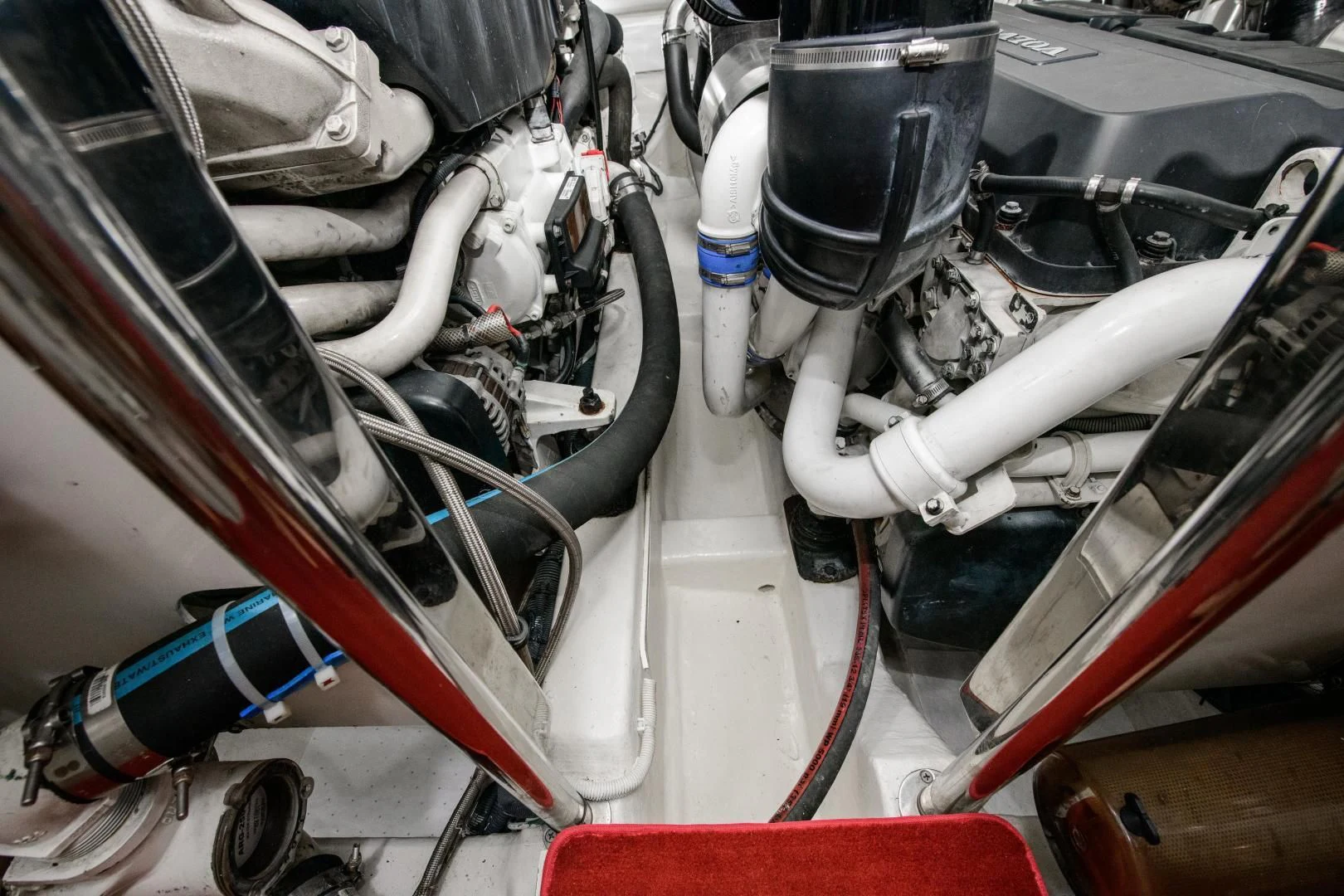 a car engine with a red and white car engine aboard CHAPTER II Yacht for Sale