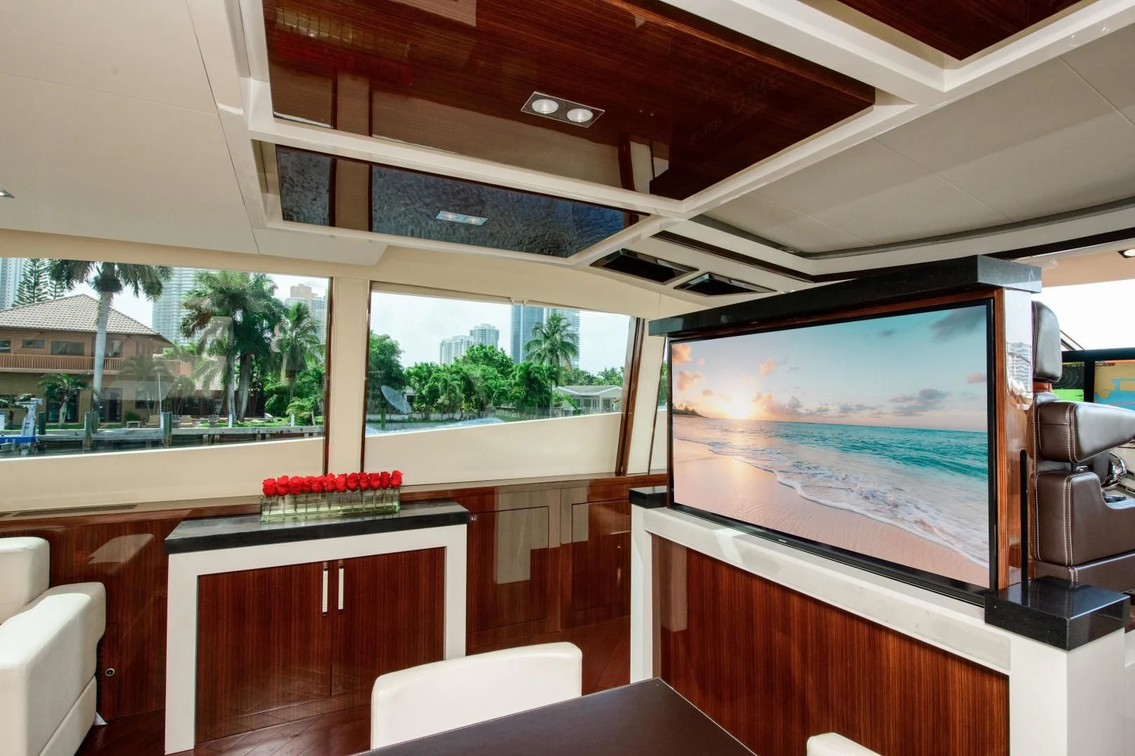 a room with a large television aboard CHAPTER II Yacht for Sale