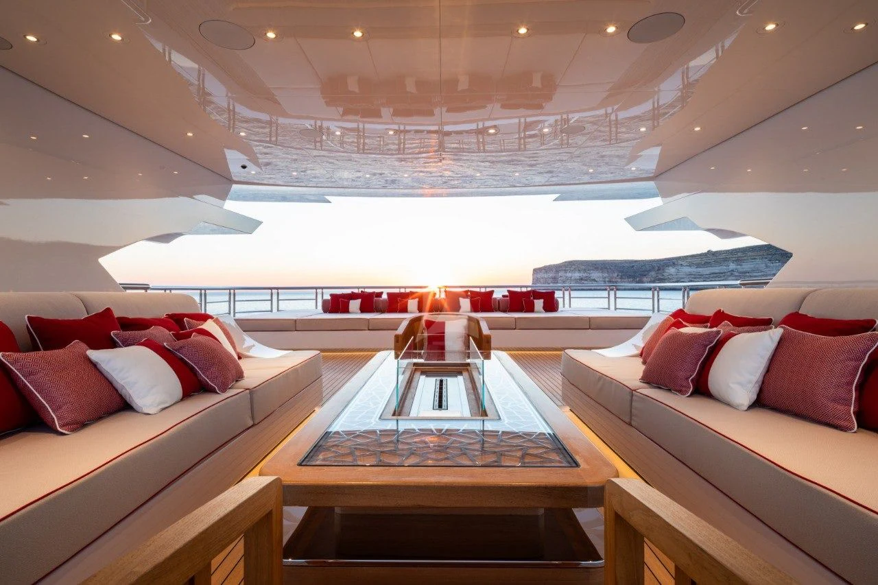 a room with a couch and a table aboard MAR Yacht for Sale