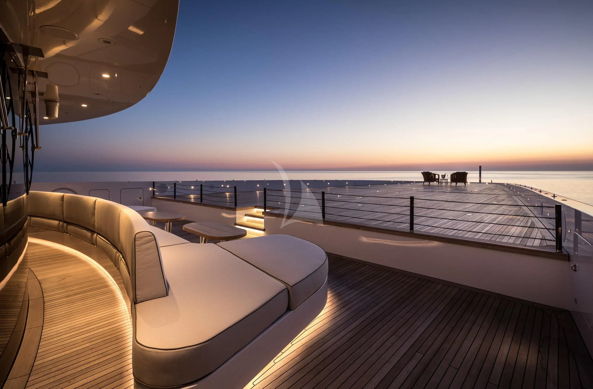 a deck overlooking a beach aboard MAR Yacht for Sale
