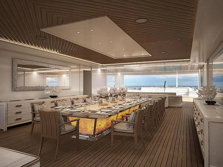 a large room with a table and chairs aboard MAR Yacht for Sale
