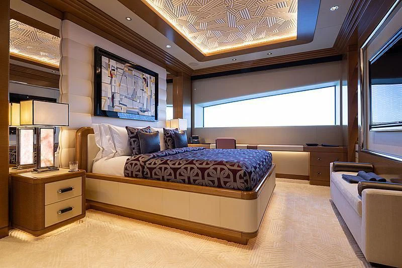 a bedroom with a large bed aboard MAR Yacht for Sale