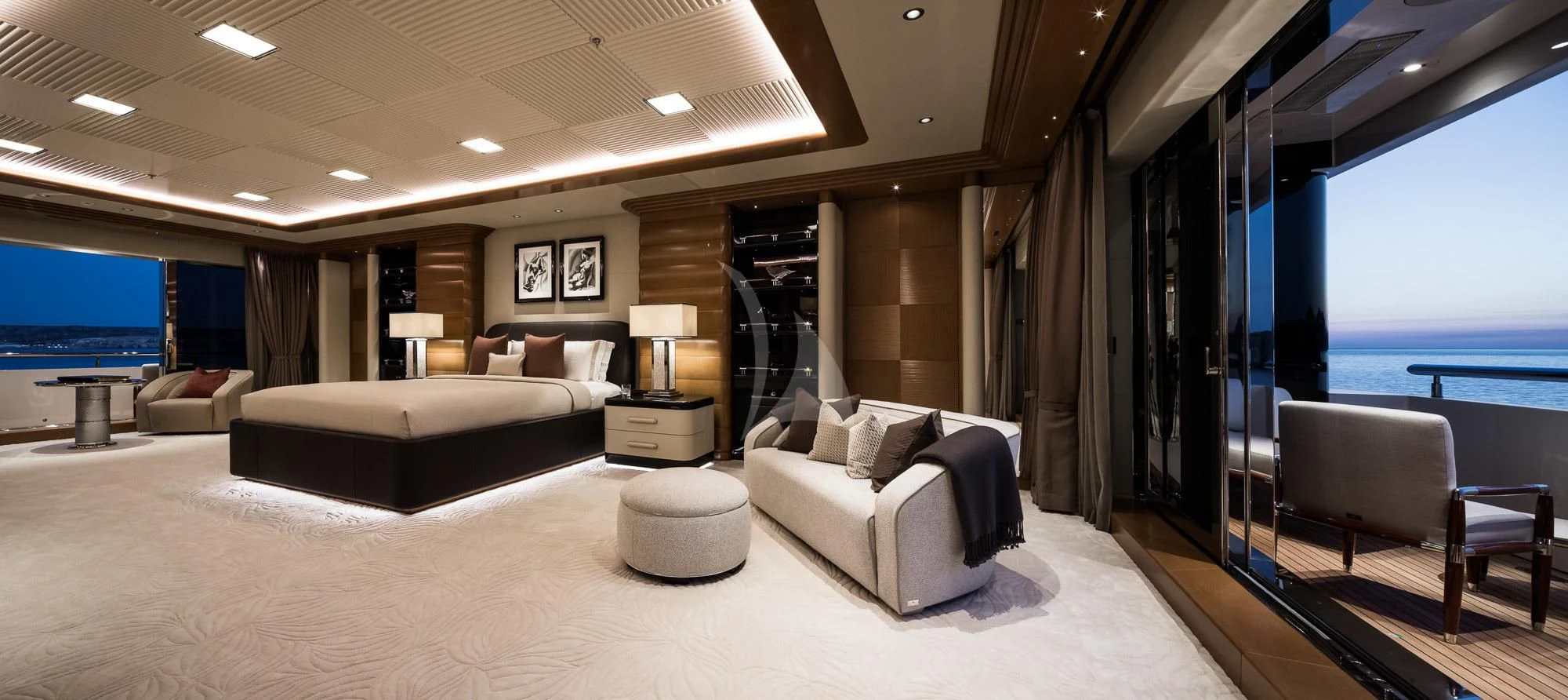 a large room with a bed and a couch aboard MAR Yacht for Sale