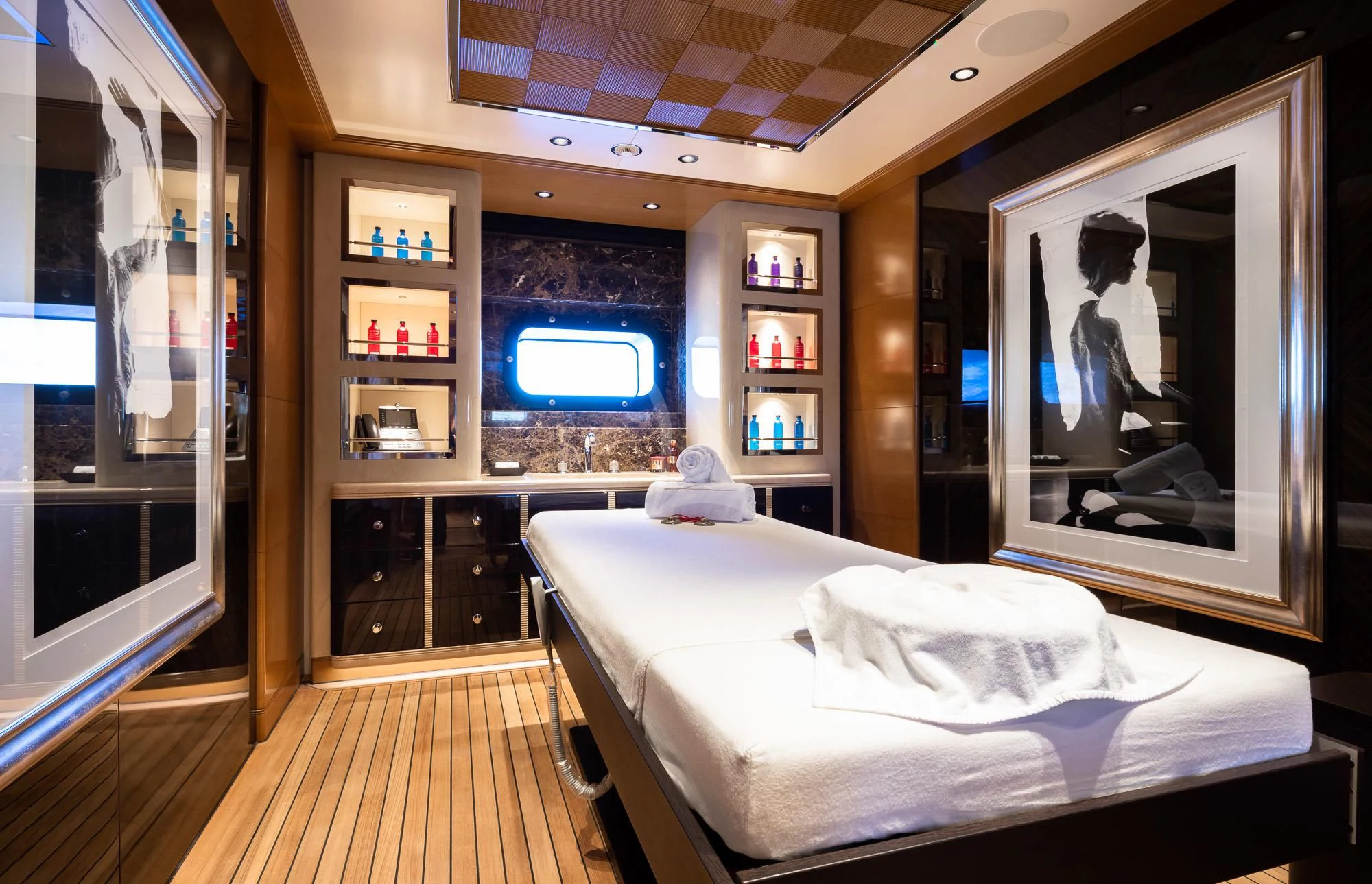 a bedroom with a large tv aboard MAR Yacht for Sale