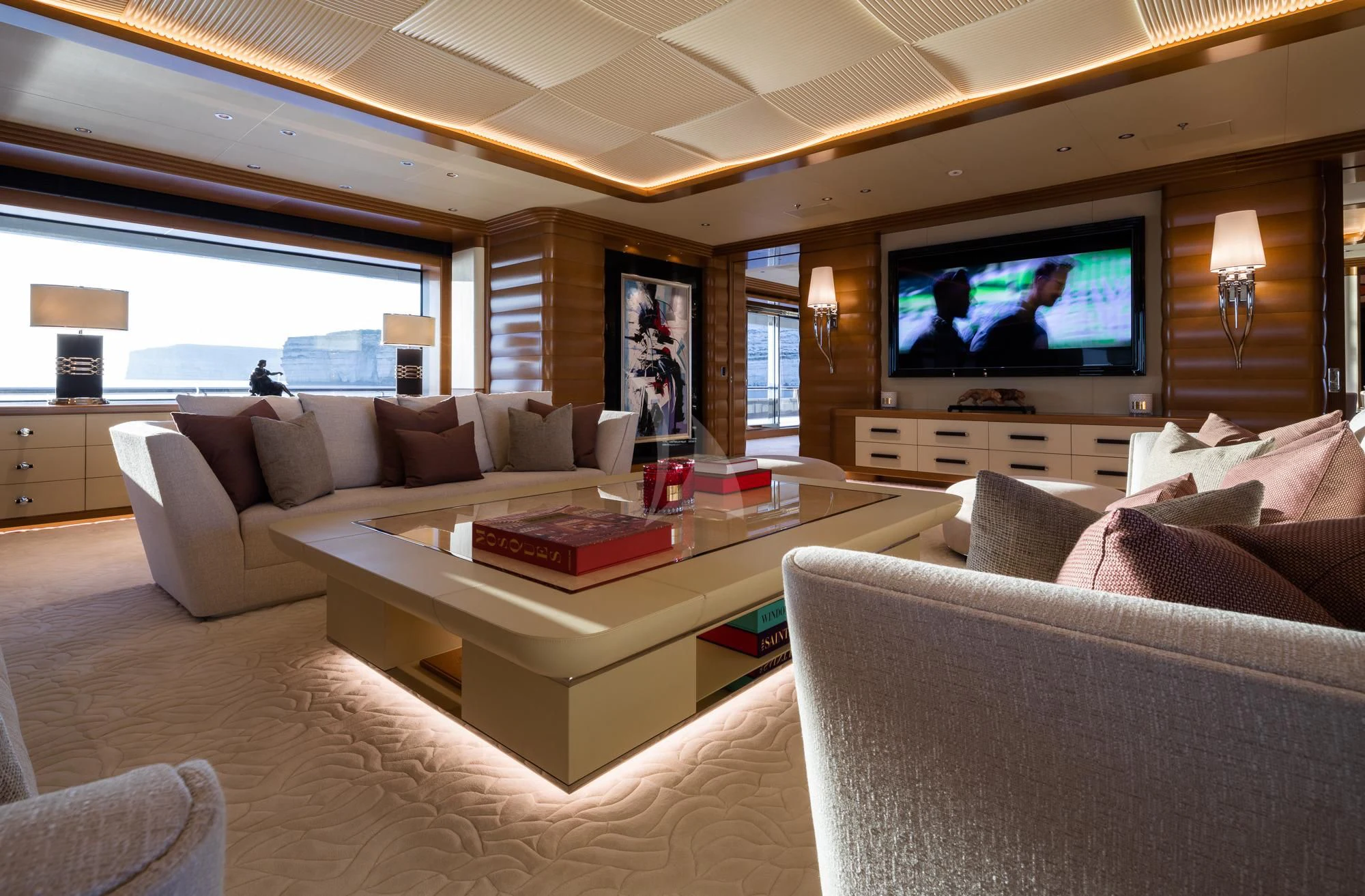 a living room with a large television aboard MAR Yacht for Sale