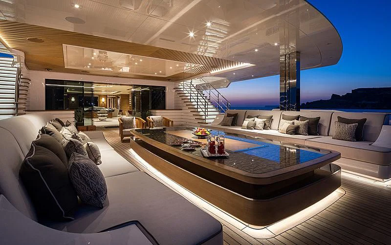 a modern living room with a large pool table and a large window aboard MAR Yacht for Sale