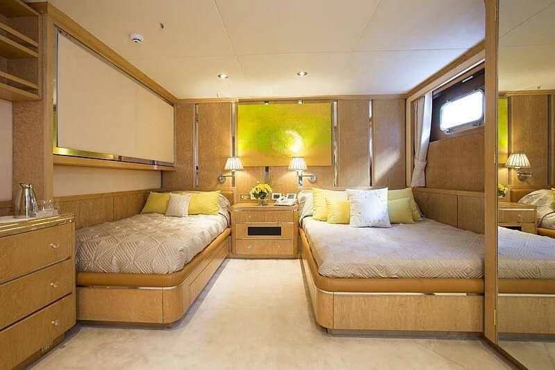 a bedroom with two beds aboard EMERALD Yacht for Charter