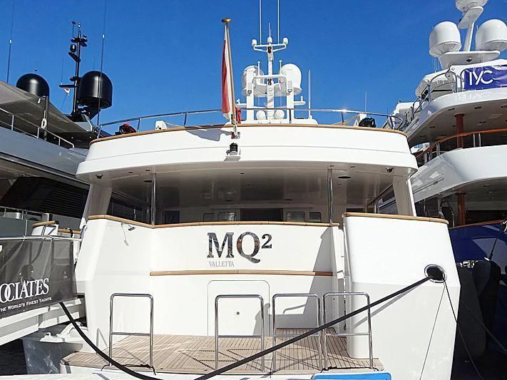 a large white boat with a blue sky aboard EMERALD Yacht for Charter