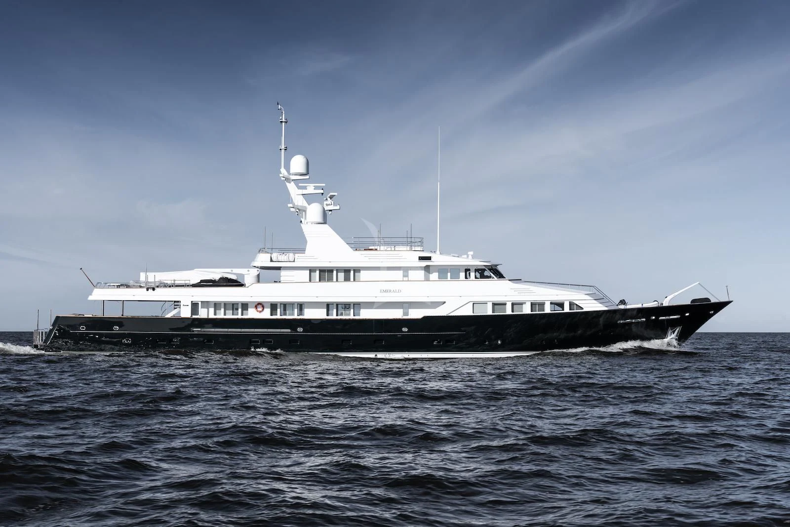 a large ship in the water aboard EMERALD Yacht for Charter