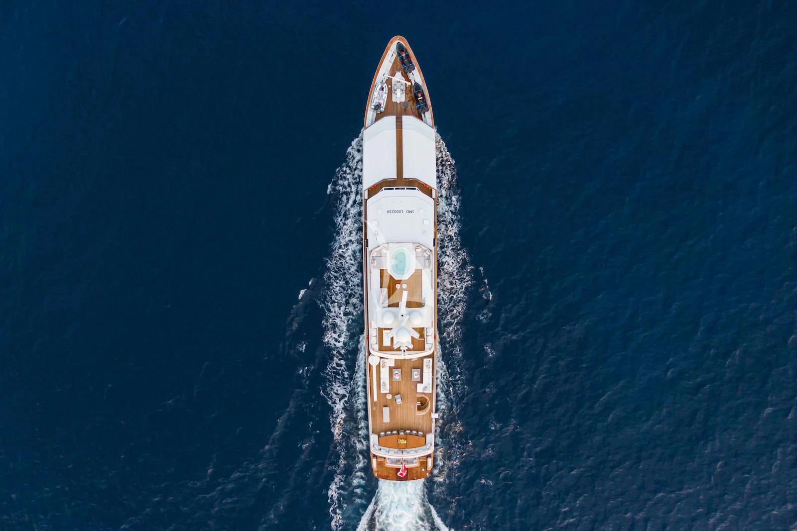 a rocket on a blue surface aboard EMERALD Yacht for Charter
