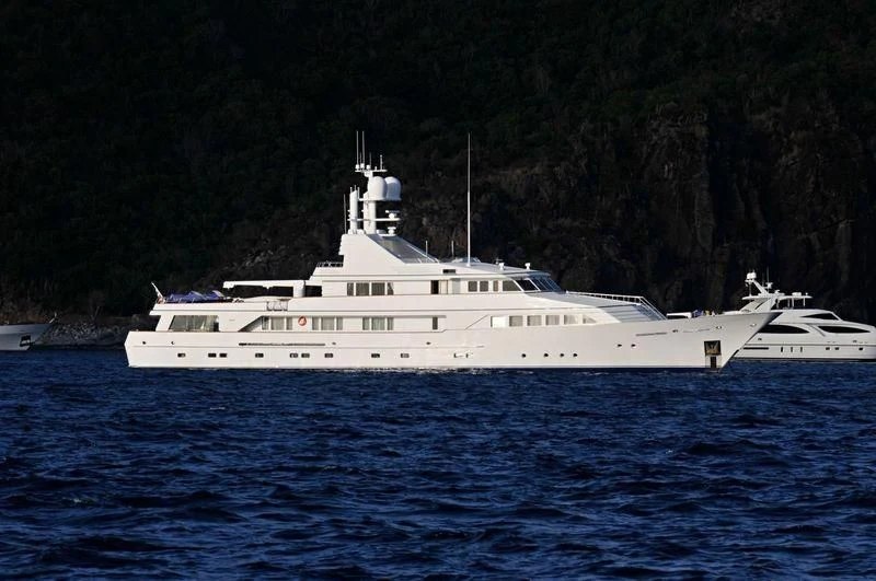 a large white boat in the water aboard EMERALD Yacht for Charter