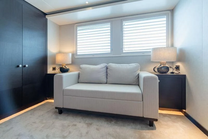 a couch in a room aboard EMERALD Yacht for Charter