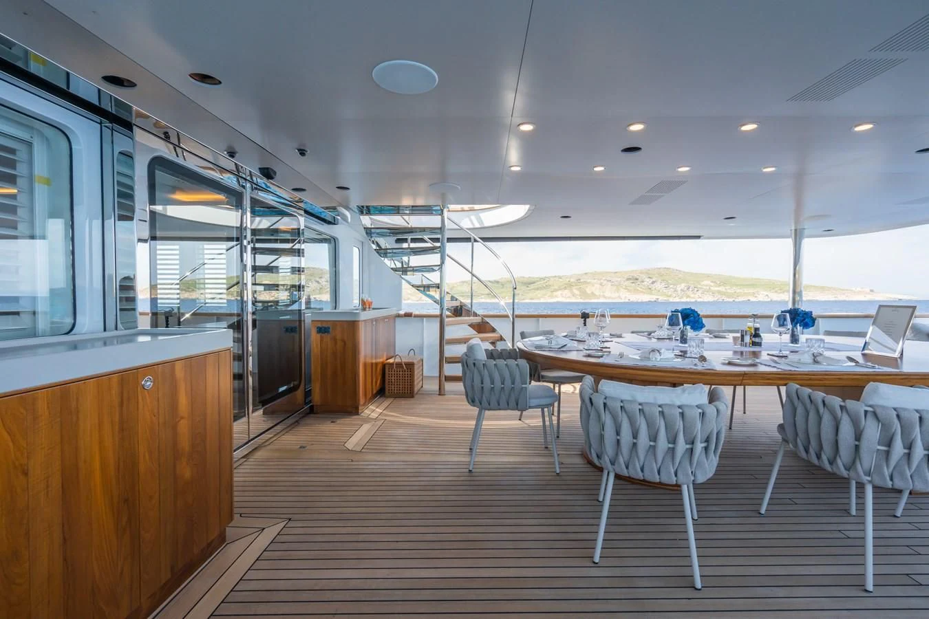 a room with a table and chairs aboard EMERALD Yacht for Charter