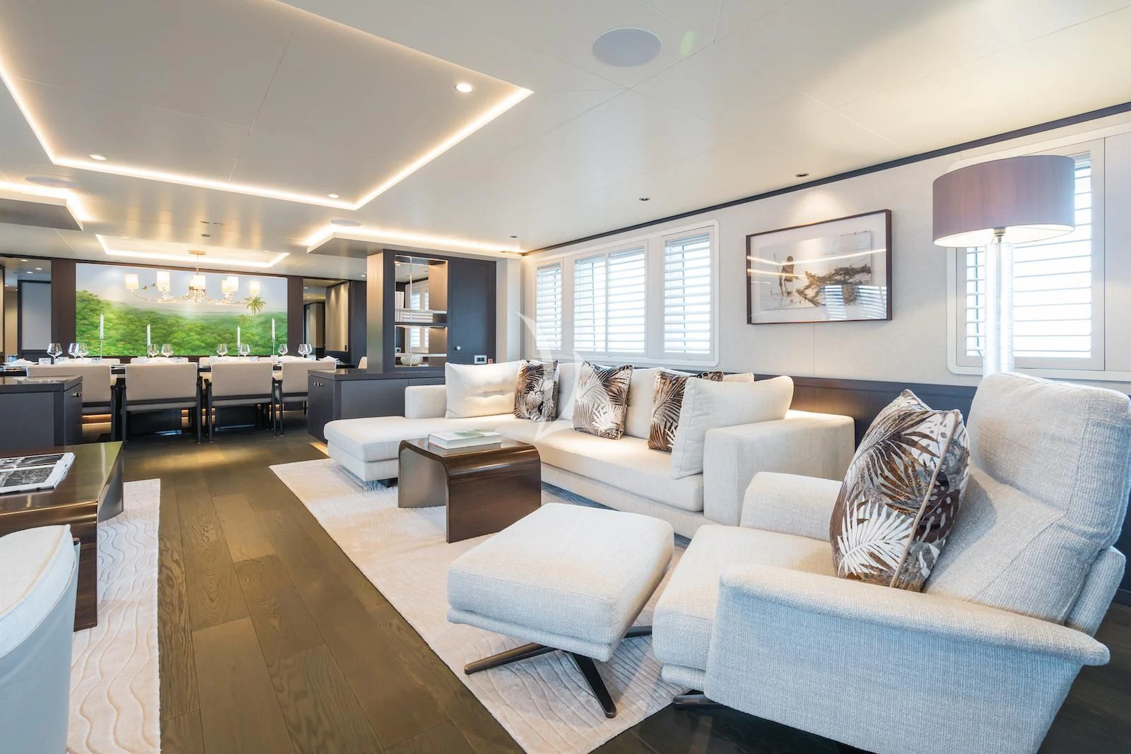 a living room with a couch and a table aboard EMERALD Yacht for Charter
