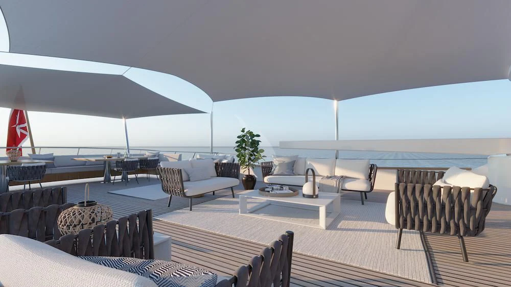 a large lounge area with a large patio and a large umbrella aboard EMERALD Yacht for Charter