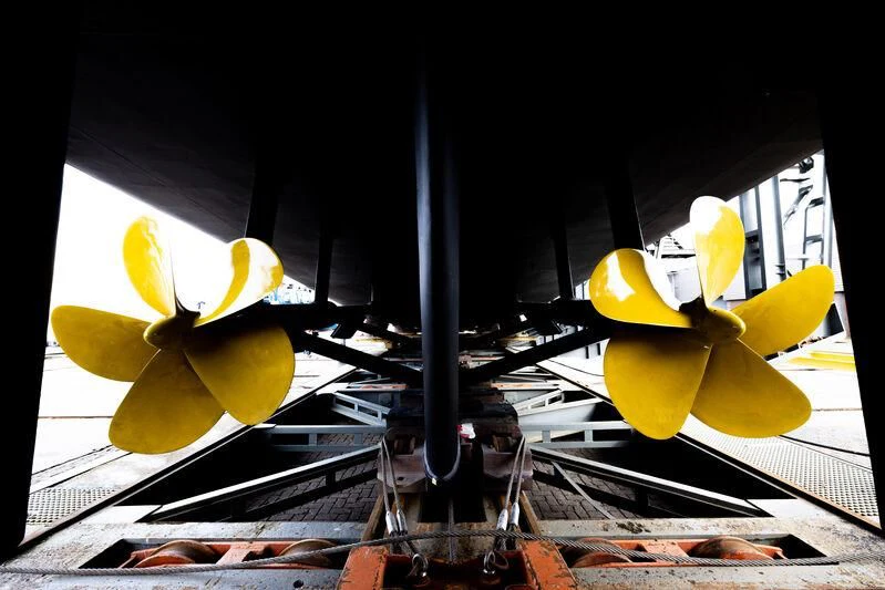 a group of yellow flowers on a table aboard EMERALD Yacht for Charter