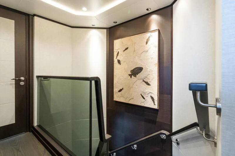 a bathroom with a painting on the wall aboard EMERALD Yacht for Charter