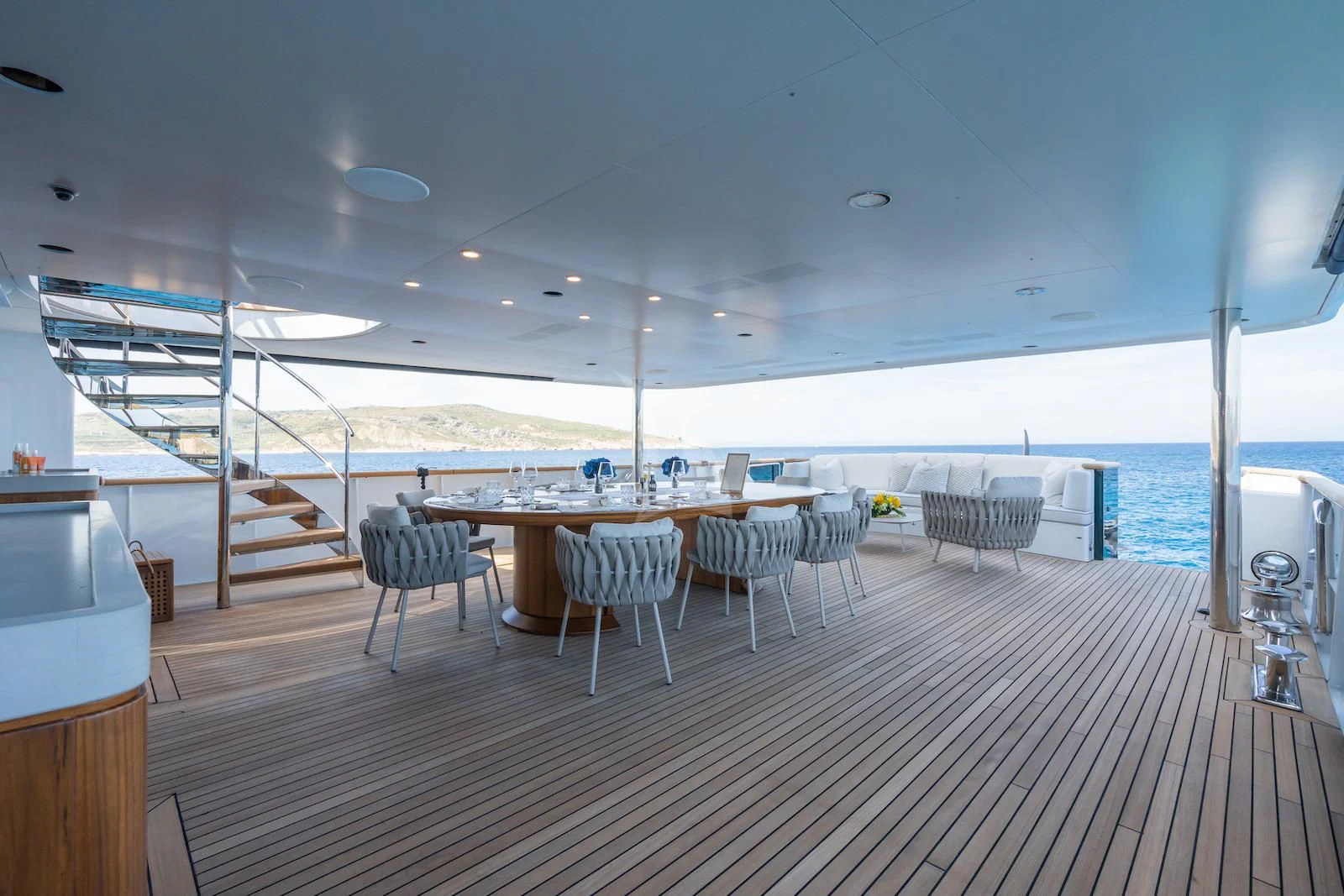 a deck with a large pool aboard EMERALD Yacht for Charter