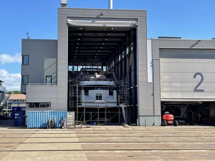 a building with a ladder aboard EMERALD Yacht for Charter