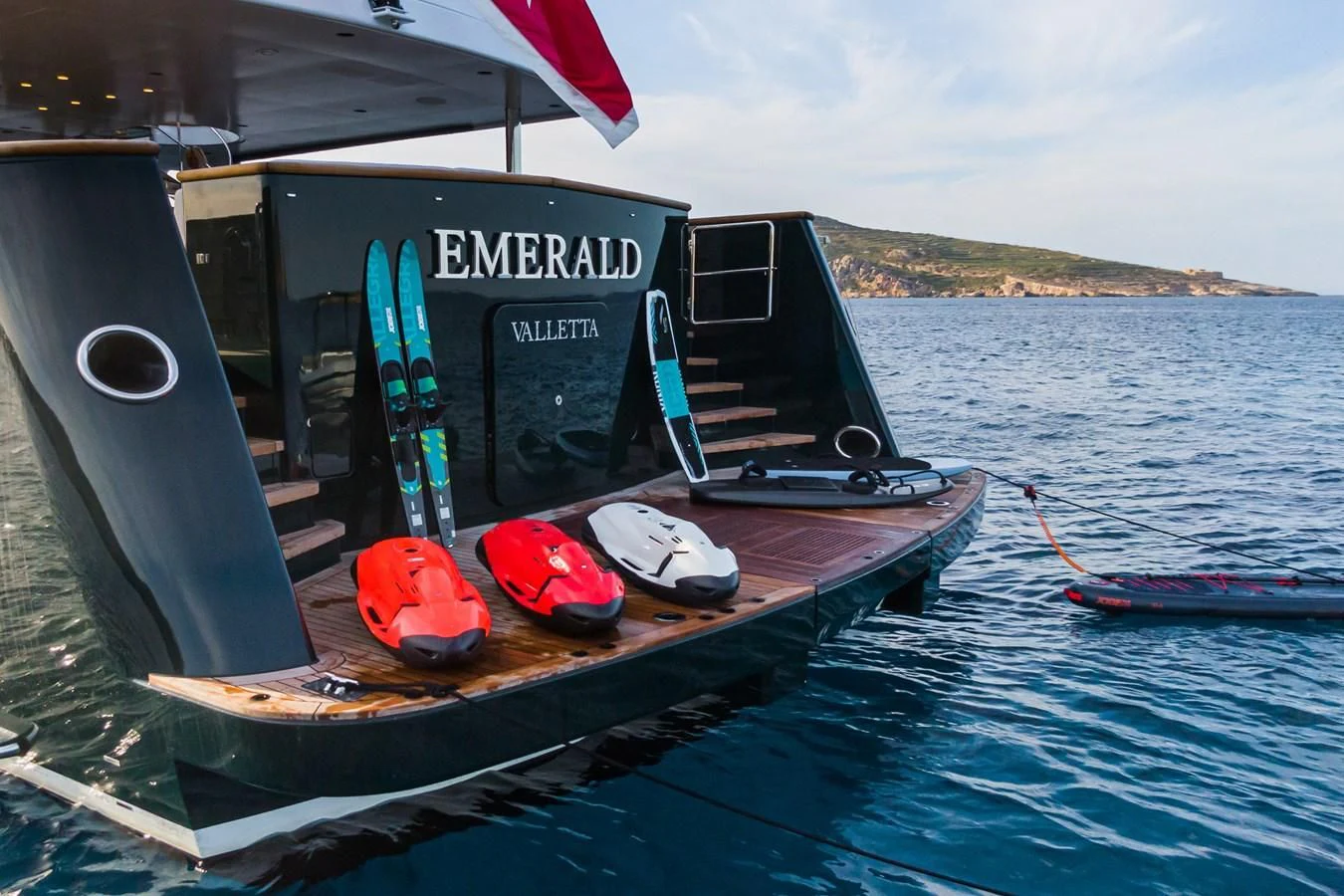 a boat with a paddle on the front aboard EMERALD Yacht for Charter