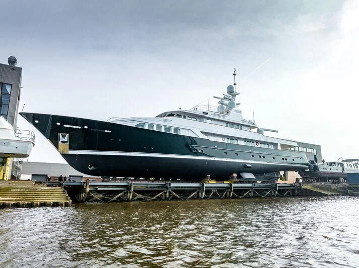 a large ship docked aboard EMERALD Yacht for Charter