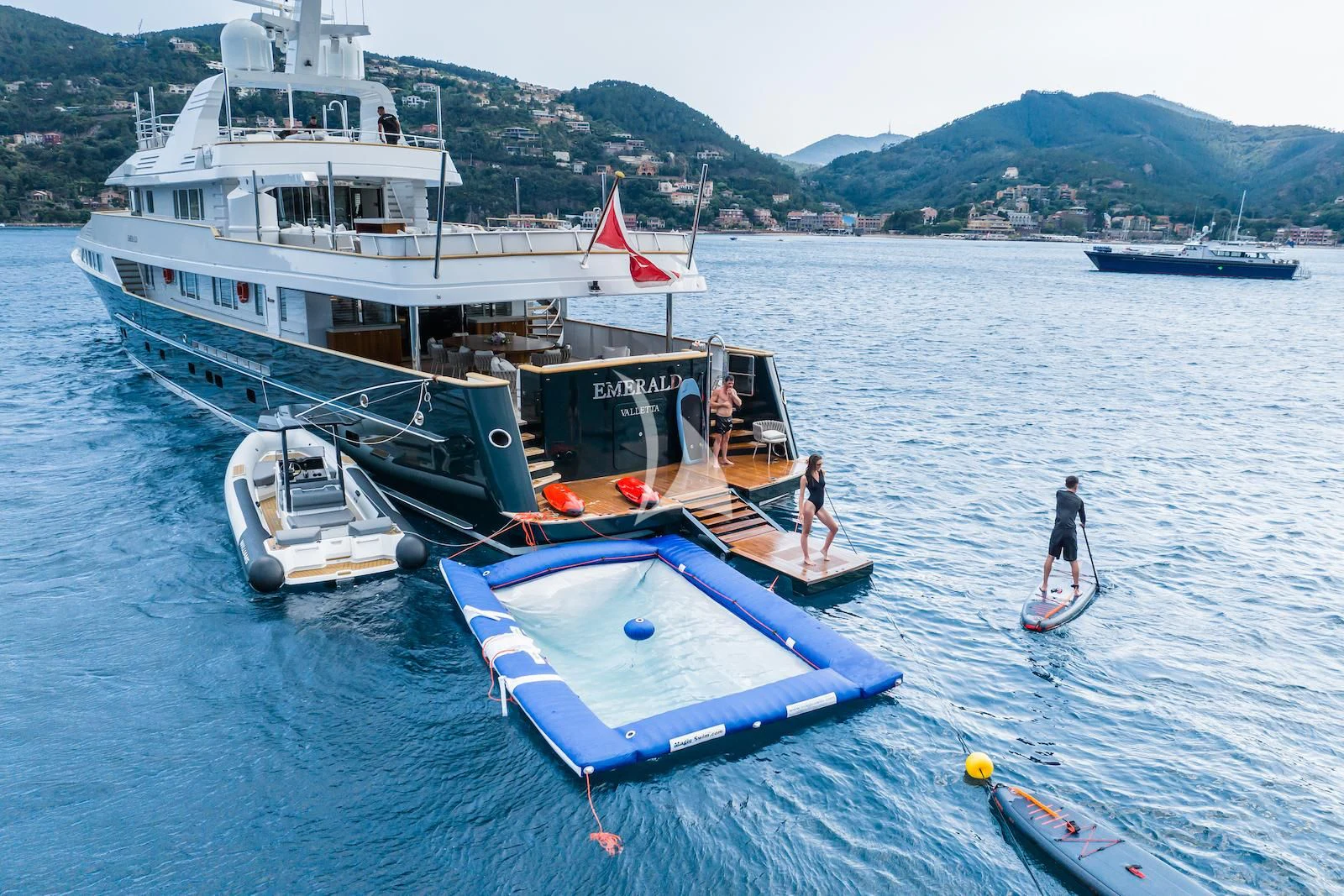 a couple of people on a boat aboard EMERALD Yacht for Charter