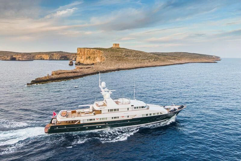 a boat sailing on the sea aboard EMERALD Yacht for Charter