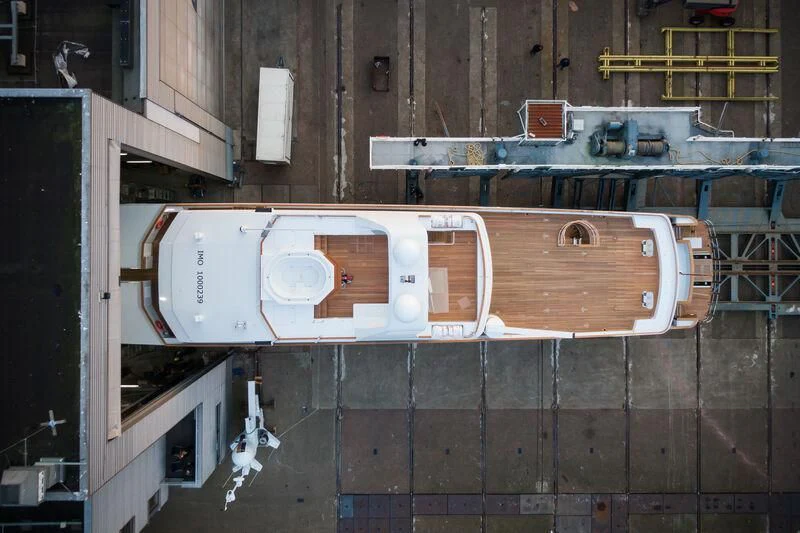 a gun and a gun on a brick wall aboard EMERALD Yacht for Charter